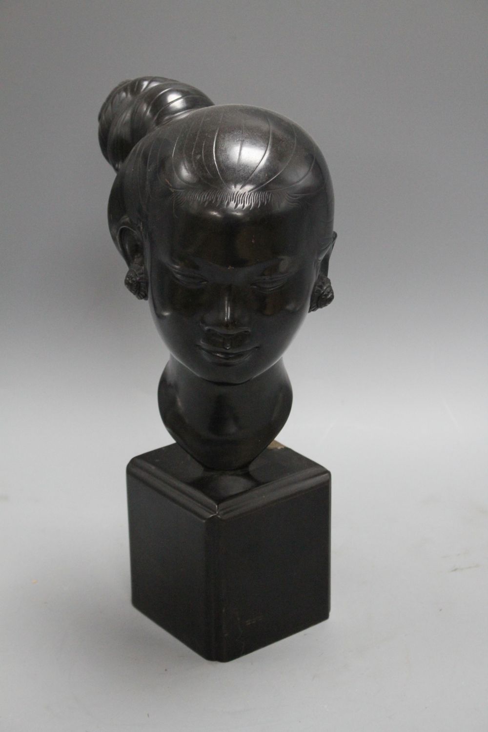 Nguyen Thanh Le (1919- Vietnam). A bronze head of a Vietnamese woman,